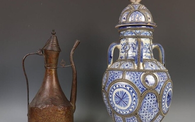 Morocco, stoneware lidded vase with imposed metal patterns,...