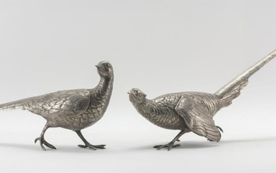 PAIR OF GERMAN SILVER PLATED TABLE PHEASANTS Male and female, with hinged wings. Maker's mark under the female's wing. Marked "Germa.