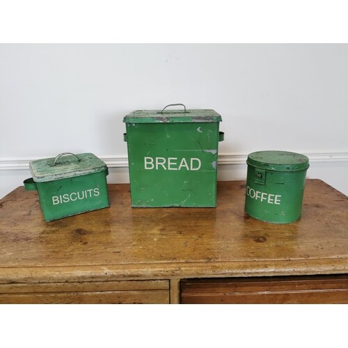 Painted metal bread, coffee and biscuit tins.