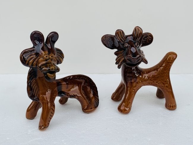 Pair of Stylized ceramic Lions