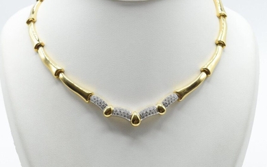Semi-rigid necklace in 18 ct yellow and white gold set with 56 brilliants +/- 1.50 ct - 51.8 g (+/- 45 cm) + box