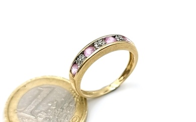Star Lot : A beautiful pink spinel and diamond ring set in a...