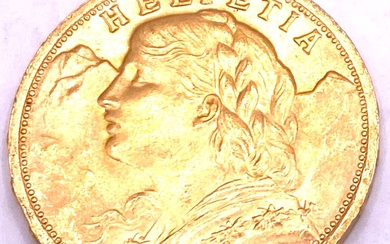 Suisse - Pièce de 20 francs suisse tête d'Helvetia en or jaune datant de 1935...