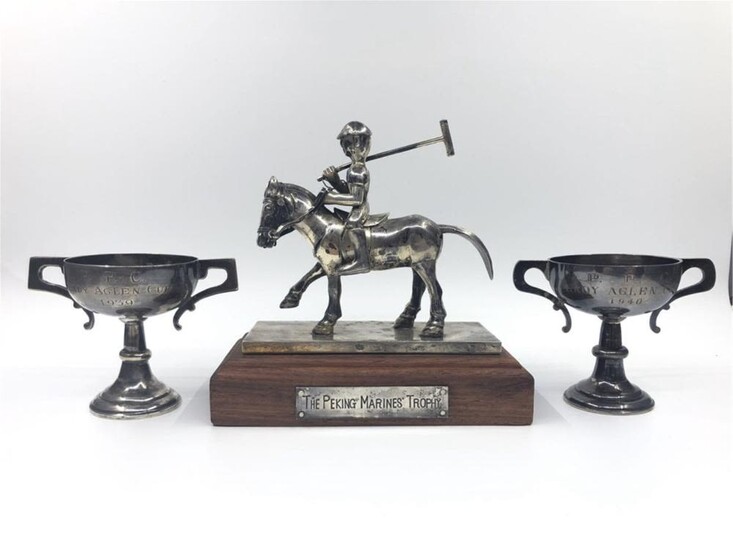 THE SILVER TROPHIES FROM THE MARINE CORPS JOCKEY C