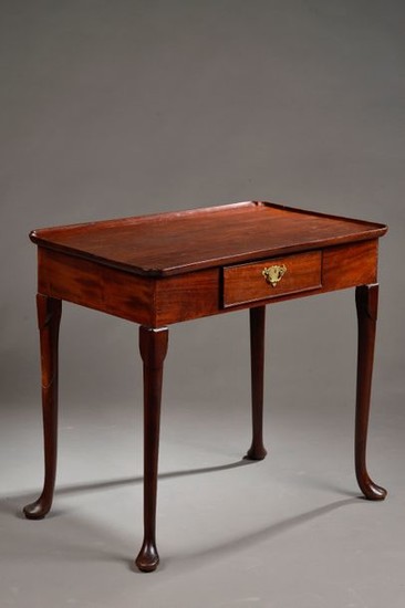 Solid mahogany cabaret table opening to a drawer...