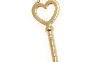 NOT SOLD. Tiffany & Co.: A "Keys Heart" pendant of 18k gold in the shape...