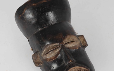 Tribal Art: 'Bwoom' Kuba mask of carved and patinated wood. Congo. 1st half of the 20th century.