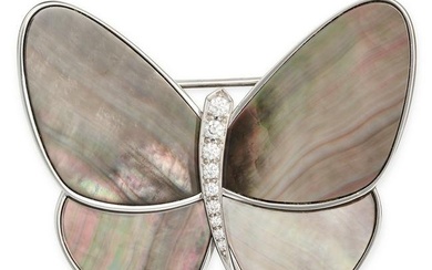 VAN CLEEF & ARPELS, A MOTHER OF PEARL AND DIAMOND BUTTERFLY BROOCH in white gold, designed as a b...