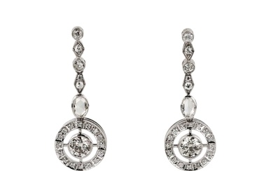 White gold earrings with diamonds. Gold 750 tests. Central...