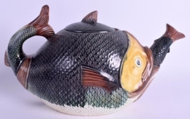 A 19TH CENTURY FRENCH MAJOLICA CARP TEAPOT AND COVER.
