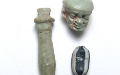 A pair of Egyptian faience items and a glass bead