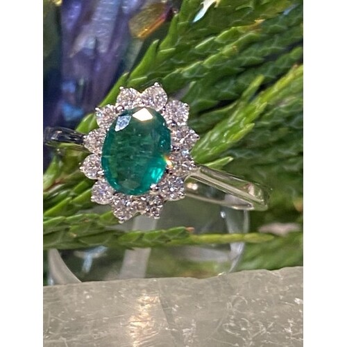 18ct white gold Colombian Emerald and diamond claw set clust...