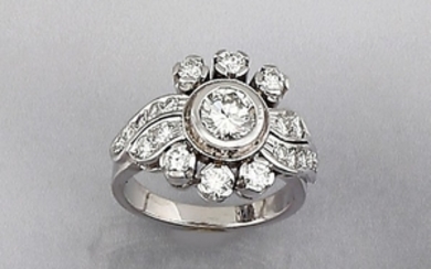 Platinum ring with diamonds , centered brilliant...