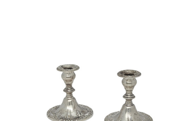 An pair of American weighted sterling silver console candleholders