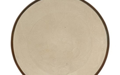 * A Carved Dingyao White Glazed Porcelain 'Lotus' Bowl