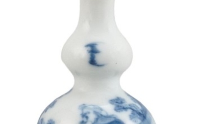 CHINESE UNDERGLAZE BLUE AND WHITE PORCELAIN SNUFF BOTTLE In double gourd form, with figural landscape decoration. Height 3.25". Cora...