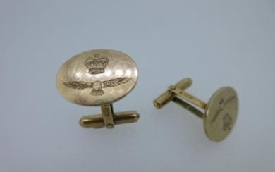 A pair of cufflinks engraved with the badge of the RAF