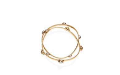 A pair of gold bangles