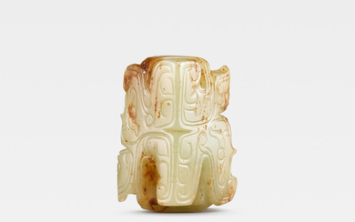 A green and russet jade 'figural' ornament