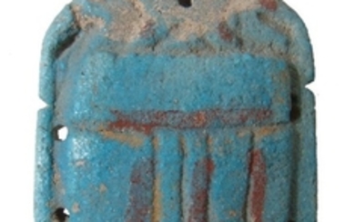 A large Egyptian faience pectoral scarab