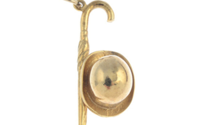 A mid 20th century 9ct gold hat and umbrella pendant.