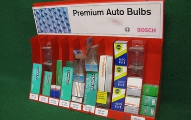 Red metal Bosch Premium Auto Bulbs sales stand with approx sixty various boxed bulbs - 21.75'' x 16'' x 6'' at base