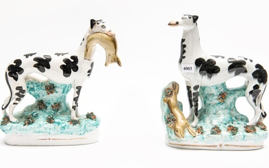 TWO STAFFORDSHIRE GREYHOUND FIGURES WITH HARES