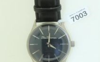 Gentlemen's Ben Sherman wristwatch, circular black dial with baton hour markers, on a black strap, part boxed