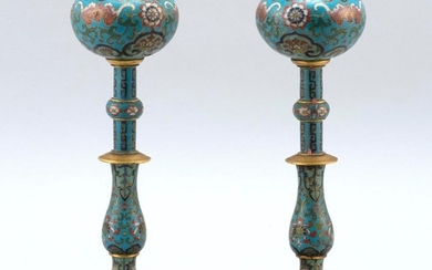 PAIR OF CHINESE CLOISONNÉ ENAMEL HAT STANDS In baluster form, with bulb tops, circular feet, and bat and flower decoration on a blue...