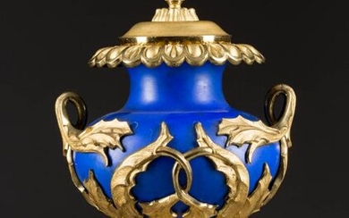 A LARGE ORMOLU-MOUNTED CERAMIC VASE WITH COVER Probably