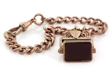 A 9CT GOLD FOB CHAIN BRACELET WITH SWIVEL-SEAL PENDANT
