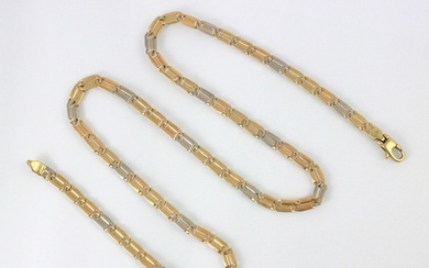 A 9ct gold two tone necklace, the flat curb link style neckl...