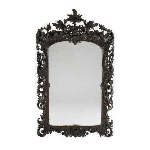 A Baroque Style Carved Walnut Mirror