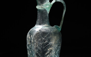 A Byzantine pale green glass hexagonal jug