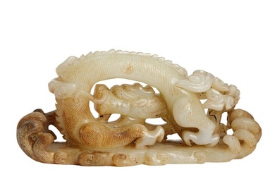 A CARVED JADE DRAGON