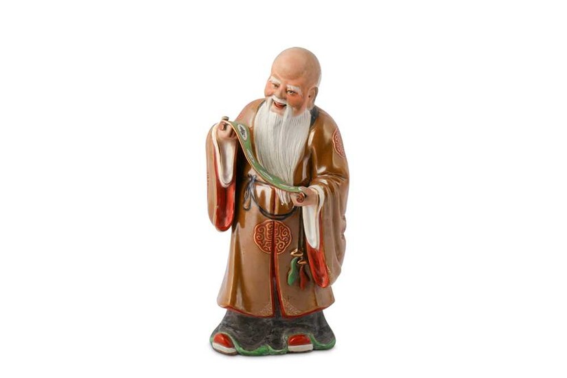 A CHINESE FAMILLE ROSE FIGURE OF A SAGE.