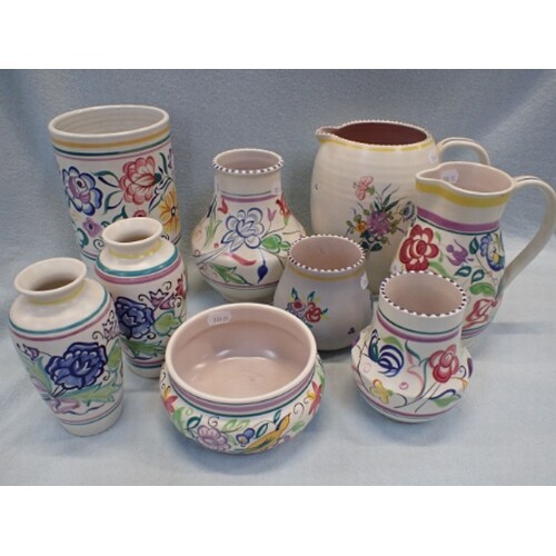 A COLLECTION OF POOLE POTTERY VASES AND JUGS with 'traditio...