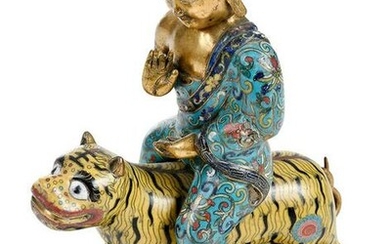 A Chinese Cloisonn‚ Figure Riding a Tiger