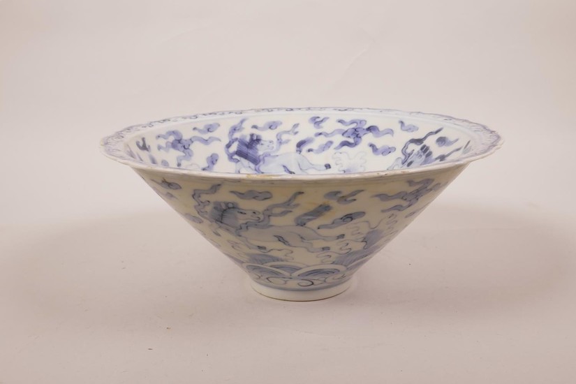 A Chinese blue and white porcelain conical bowl with a lobed...