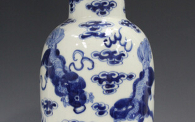 A Chinese blue and white porcelain vase, mark of Kangxi but late 19th century, the shouldered taperi