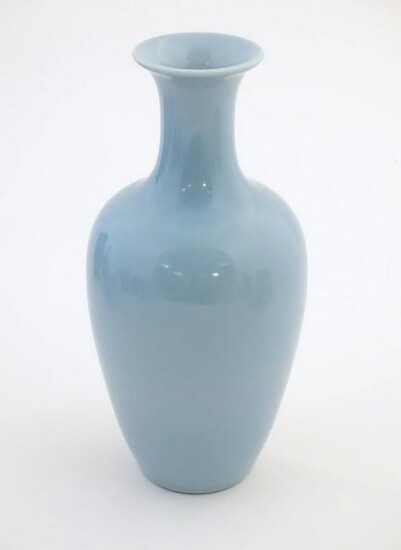 A Chinese celadon style vase of baluster form.