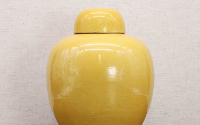 A Chinese yellow-glazed jar and cover