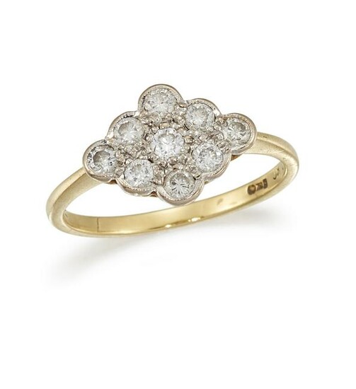 A DIAMOND CLUSTER RING Designed as a scalloped plaque