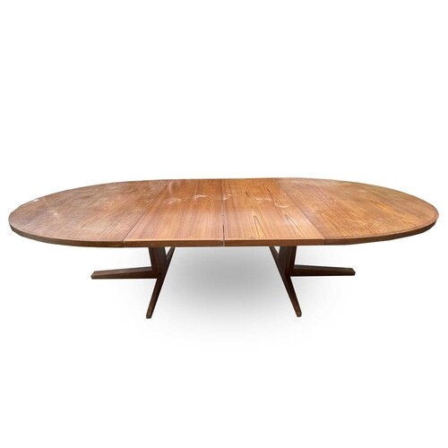 A Danish mid-century teak extending oval dining table by Joh...