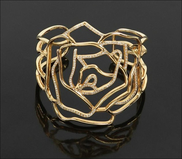 A Diamond and Rose Gold Cuff Bracelet.