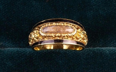 A Fine Regency Period Gold & Black Enamel Memorial Ring with a woven hairwork panel set to the front
