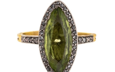 A French Belle Epoque gold, peridot and diamond cluster ring, the close-set foiled back peridot, with platinum-set rose-cut diamond border and shoulders, to a reeded hoop, French assay mark, numbered 7641, ring size I