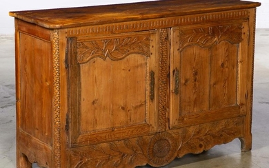 A French Provincial carved pine buffet