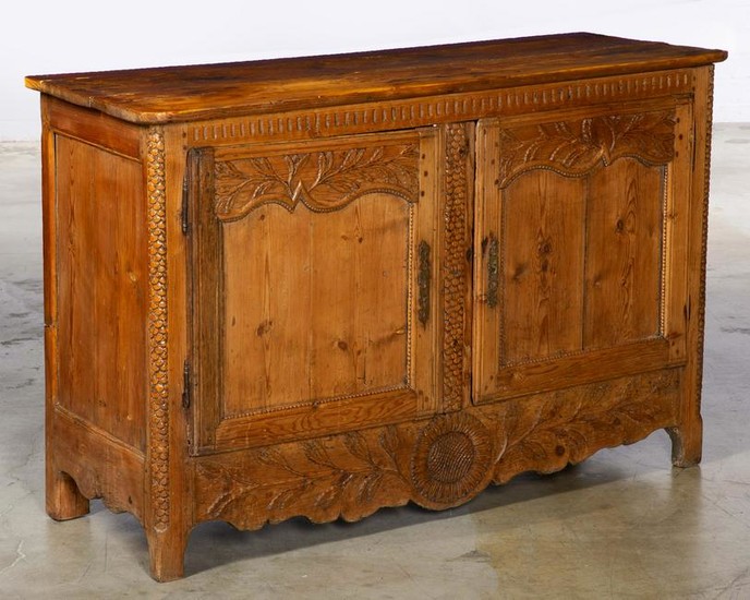 A French Provincial carved pine buffet