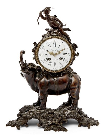 A French bronze mantel clock, late 19th century, cast as an elephant with trunk raised supporting the movement surmounted with a cherub, the white enamel dial set with Roman numerals and inscribed Lhuillier Paris, 39cm high
